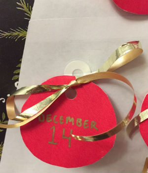 advent-cal-ornament-on-tree-300wx351h